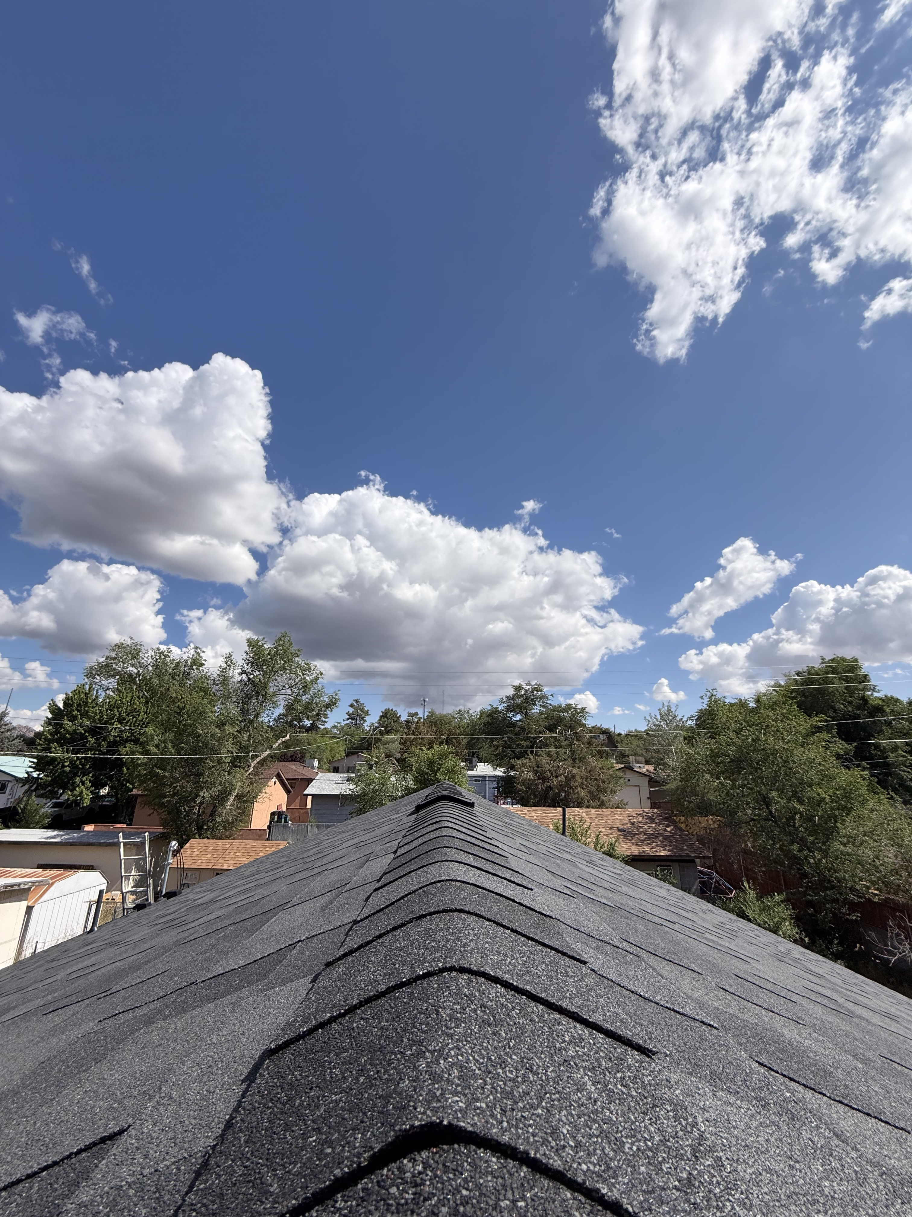 PriorityOne Roofing crew installing a roof in Arizona